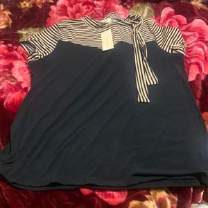 This shirt is brand new shirt the color of this shirt is tan and black